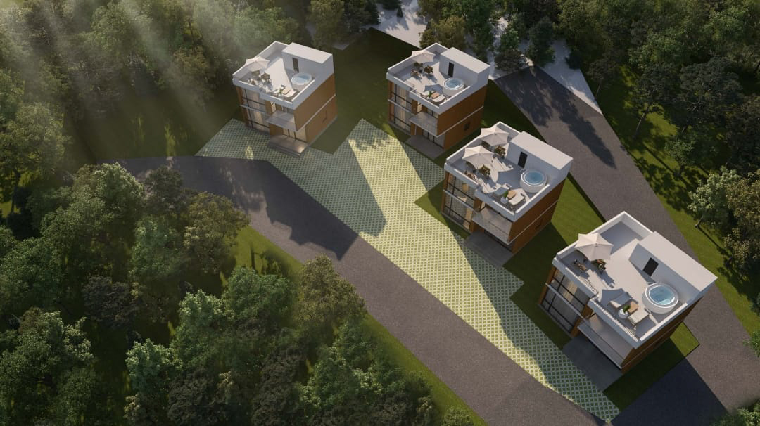 Widok Mtirala Park Villas w otoczeniu subtropikalnej przyrody z tarasami na każdym piętrze